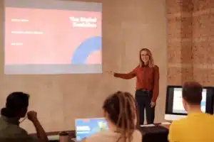Business leaders comparing AI Prompt Engineering Training with AI Strategy Training to understand how both support successful artificial intelligence adoption across an organisation.